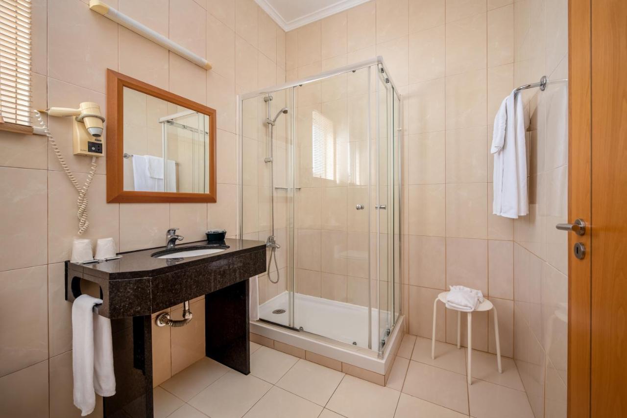 Double or Twin Room with Balcony and Sea View,1765573774:JPEG