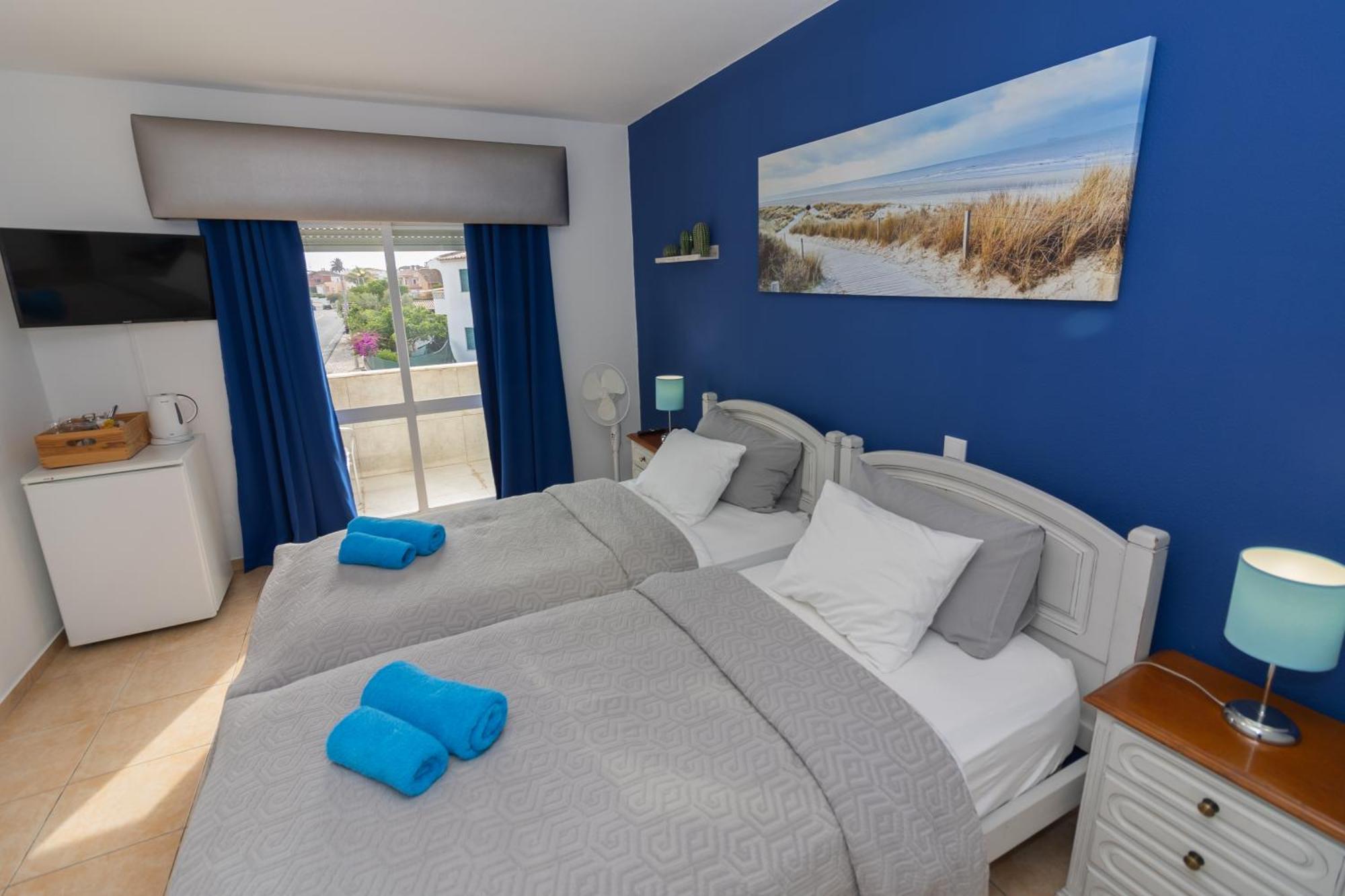 Quarto com 2 Camas de Solteiro