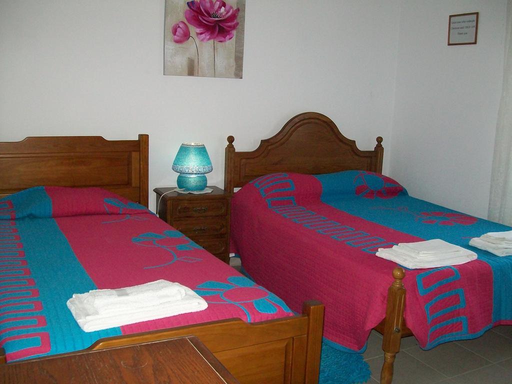 Quarto Duplo com Banheiro Compartilhado
